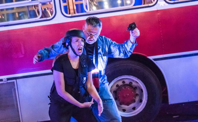 Actors performing the hostage scene at the Speed: The Movie, The Play performance