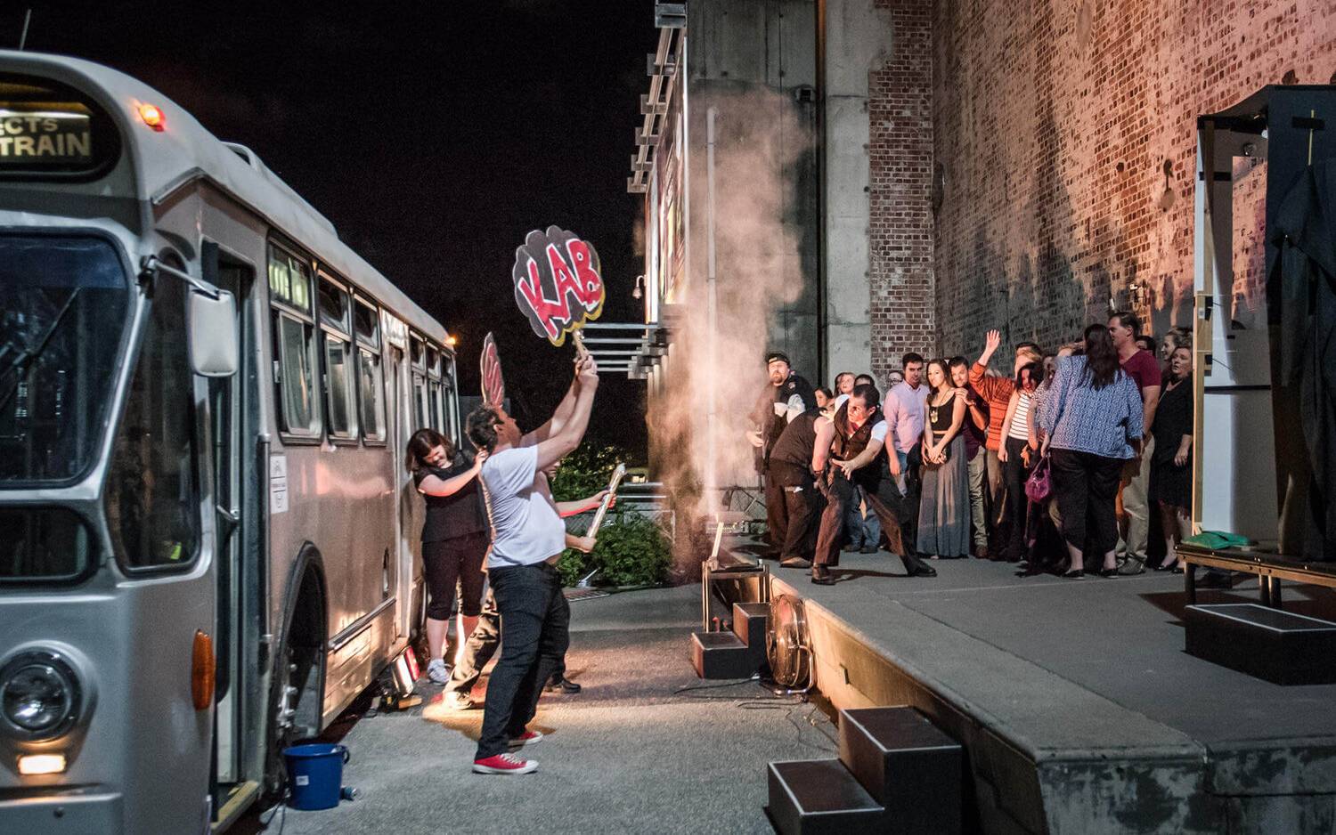 Actors performing a fake explosion for the Speed: The Movie, The Play performance